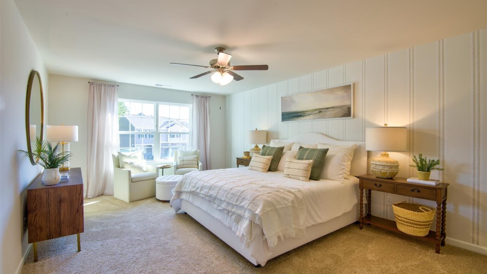 Primary bedroom with carpet flooring
