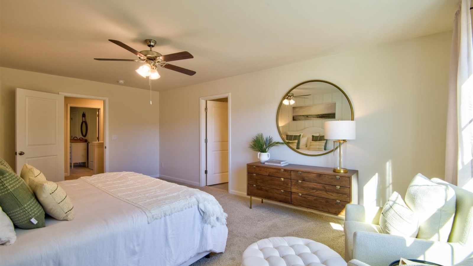 Primary bedroom with carpet flooring