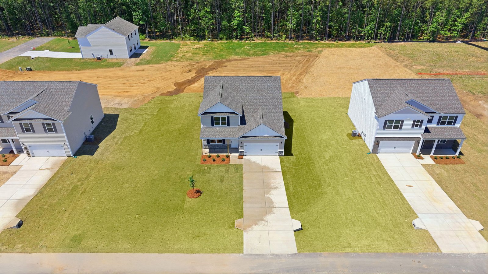 aerial view of home and driveway