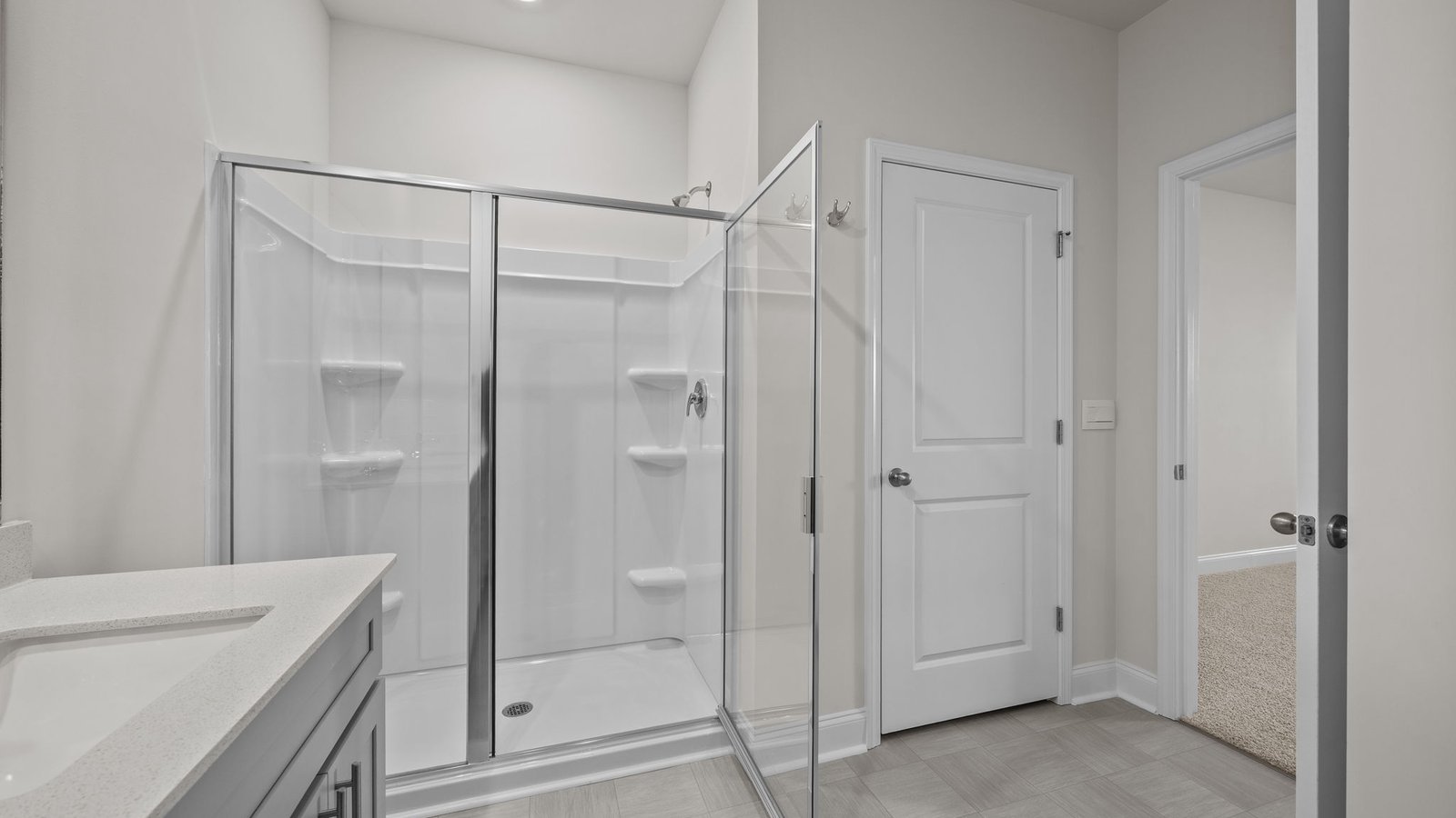 primary bathroom with walk in shower