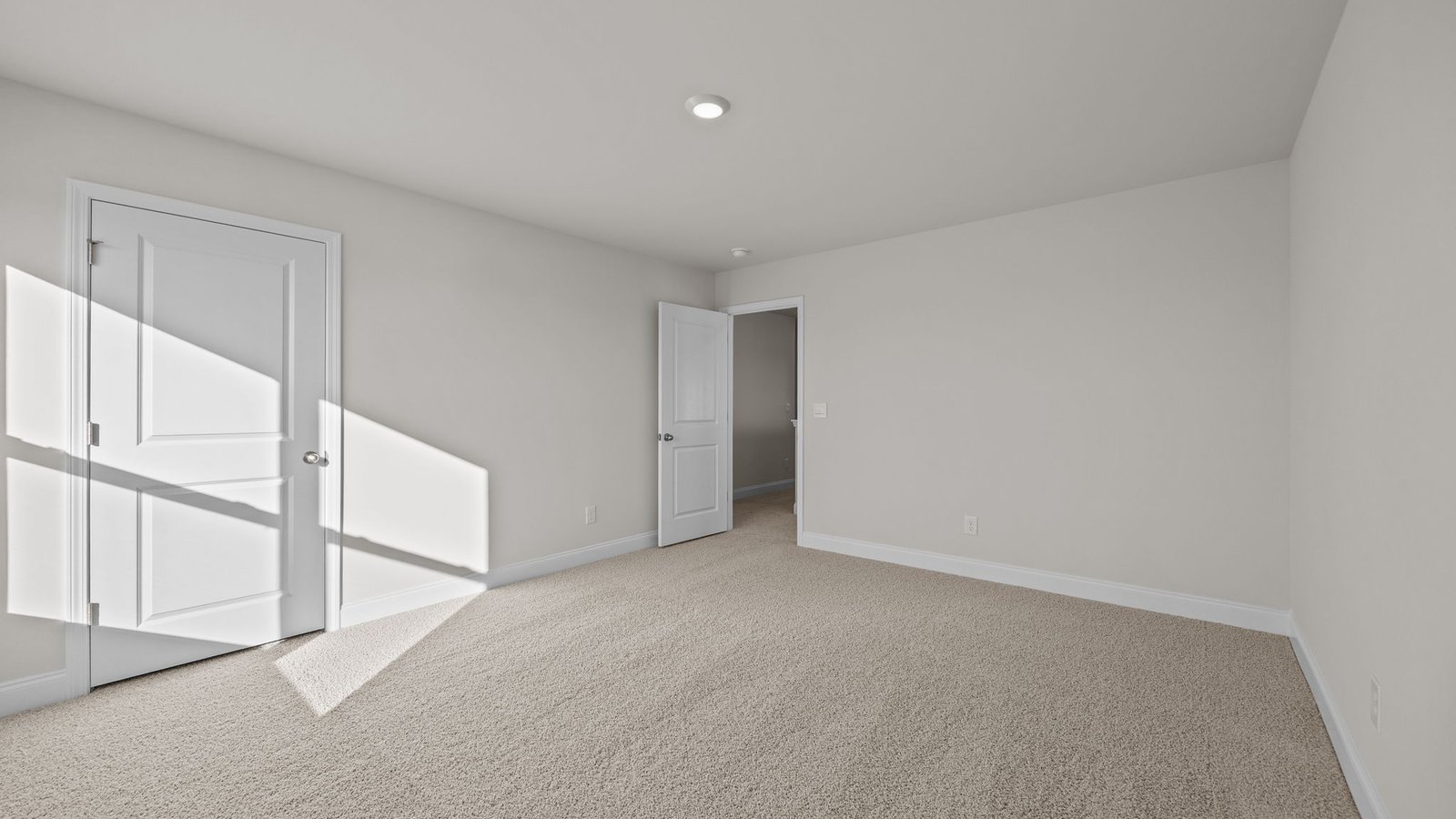 Bedroom with carpet flooring