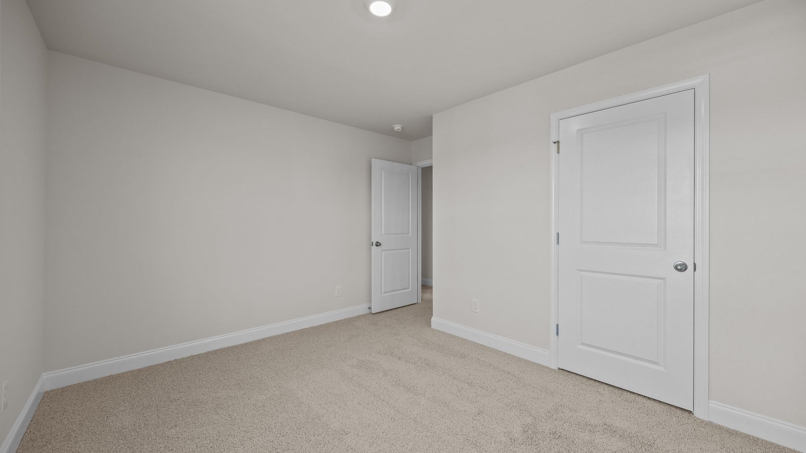 Bedroom with carpet flooring