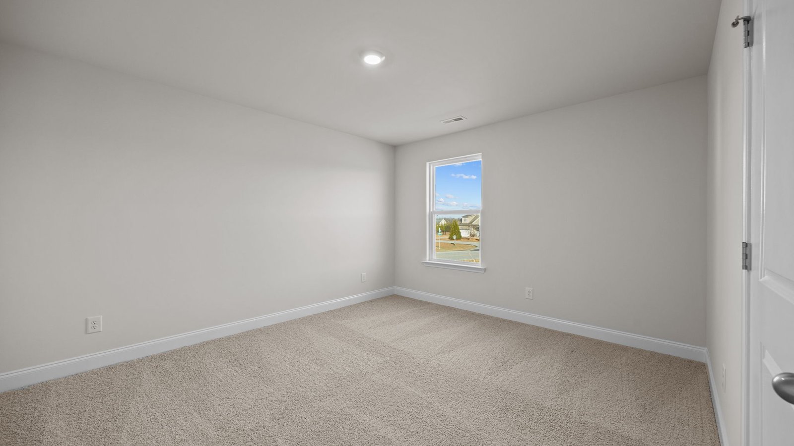 Bedroom with carpet flooring