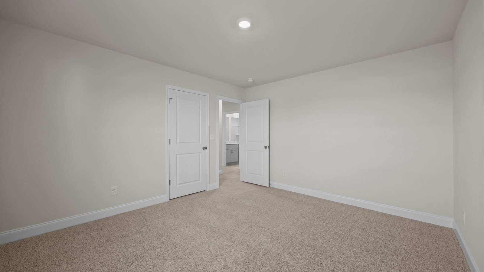 Bedroom with carpet flooring