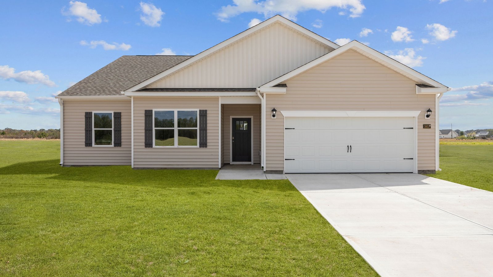 booth exterior one story home with garage
