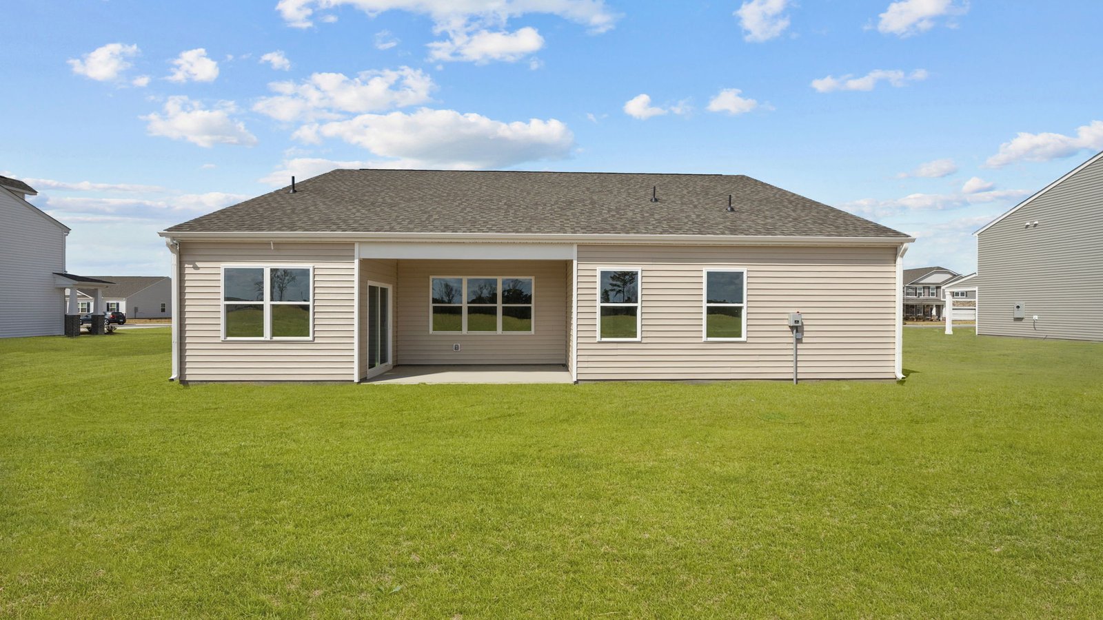 back yard view of booth one story home with back patio