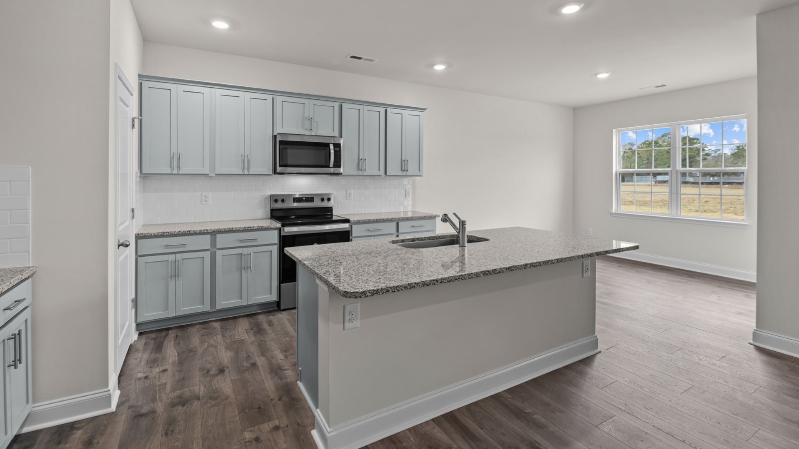 kitchen area with grey cabinets