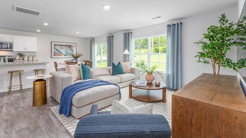 Large open living space with windows.