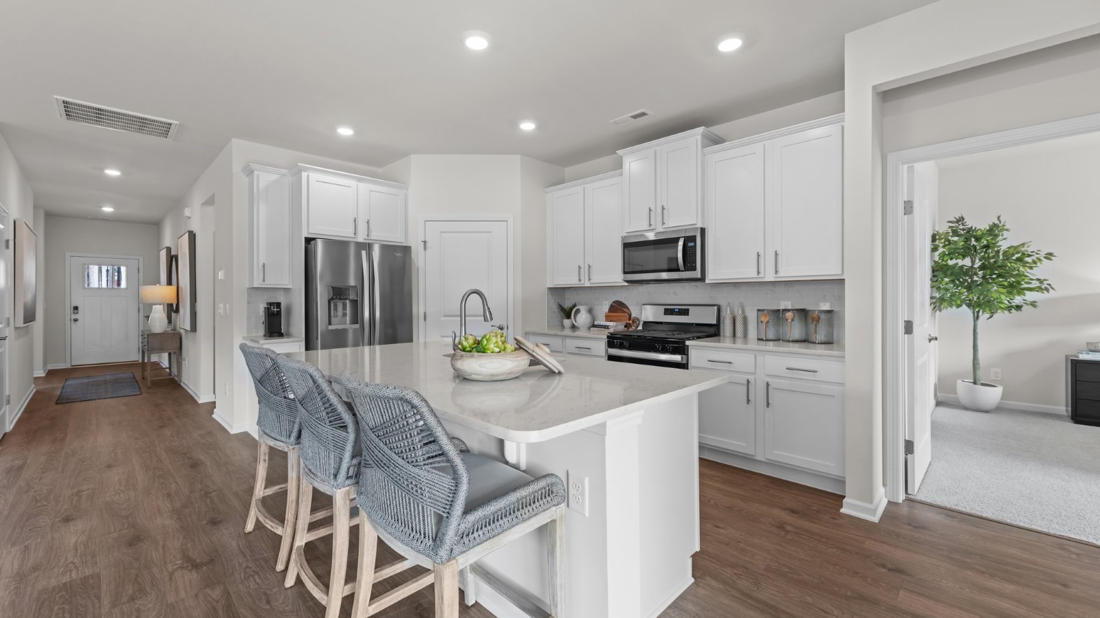 open concept living kitchen and dining area