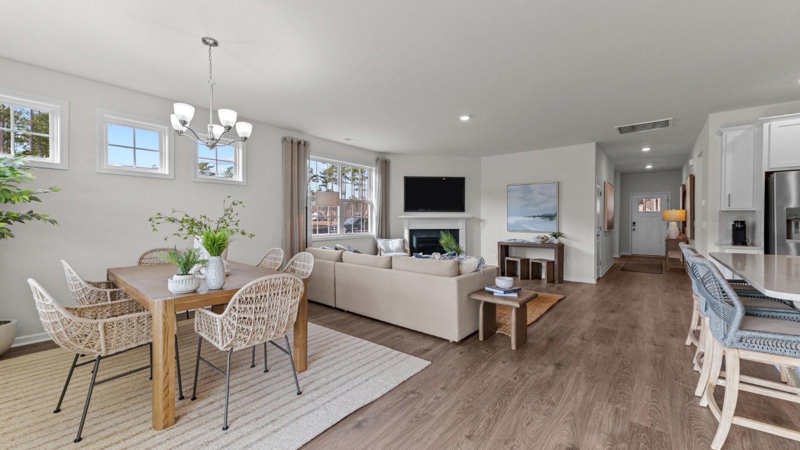 open concept living kitchen and dining area