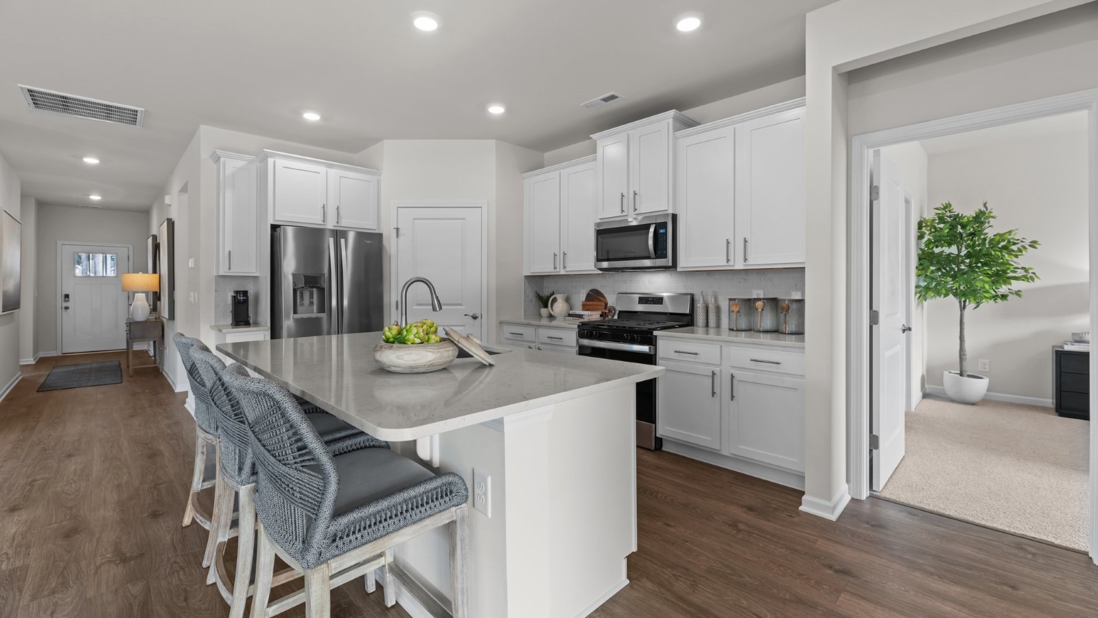 open concept living kitchen and dining space