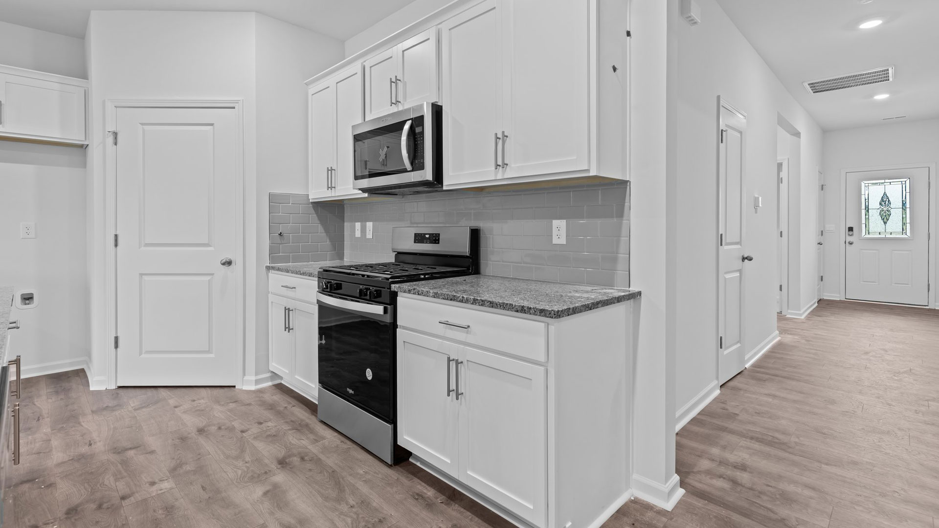 front entry leading to kitchen