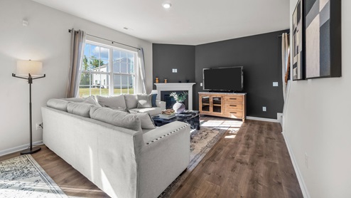 living room with revwood flooring