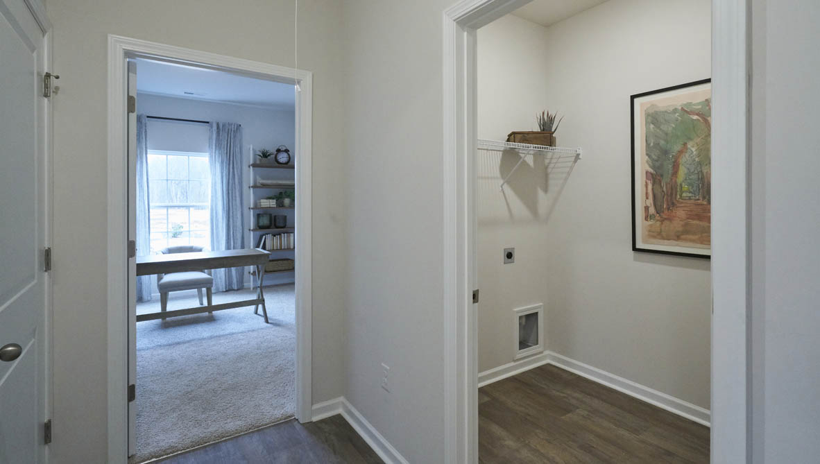 Formal study next to the entrance of the home