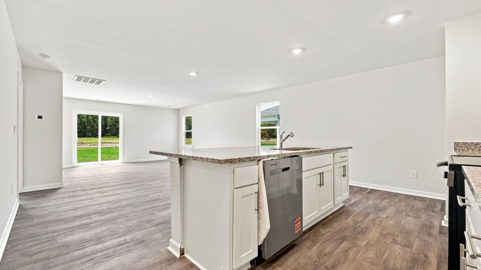kitchen area with stainless steel appliances and kitchen island