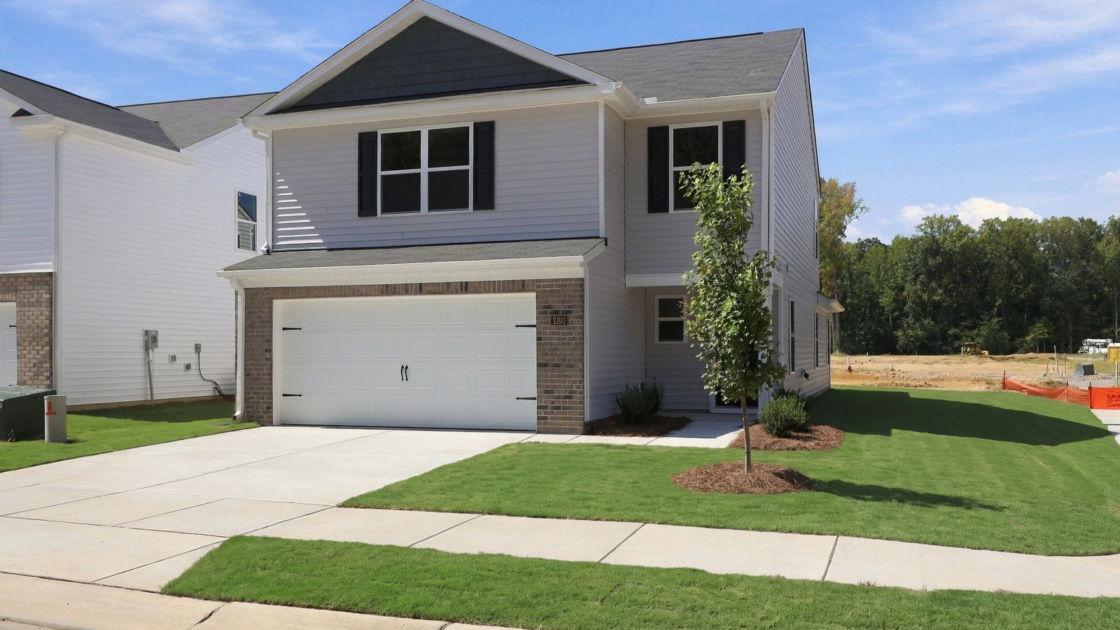 front view of two story home and driveway