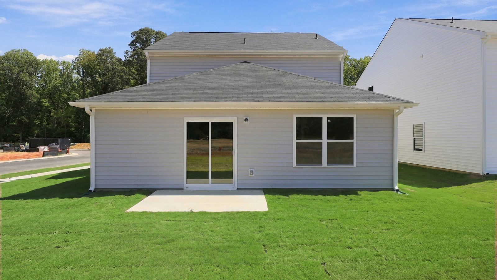 rear view of back lot and patio pad