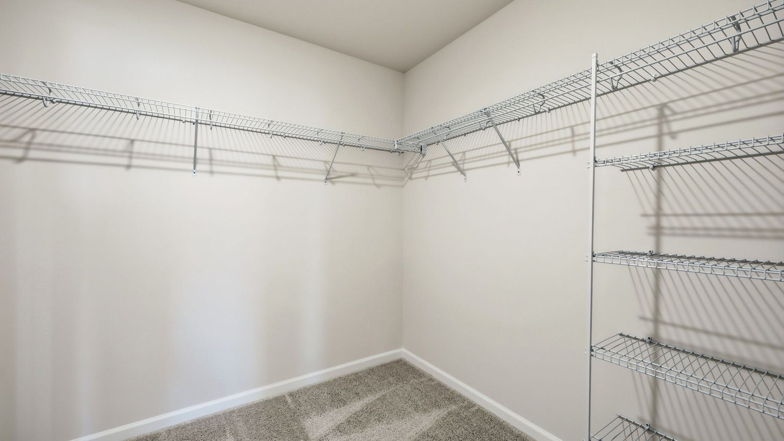walk-in closet in primary bedroom