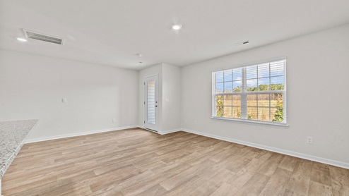living room with ample lighting