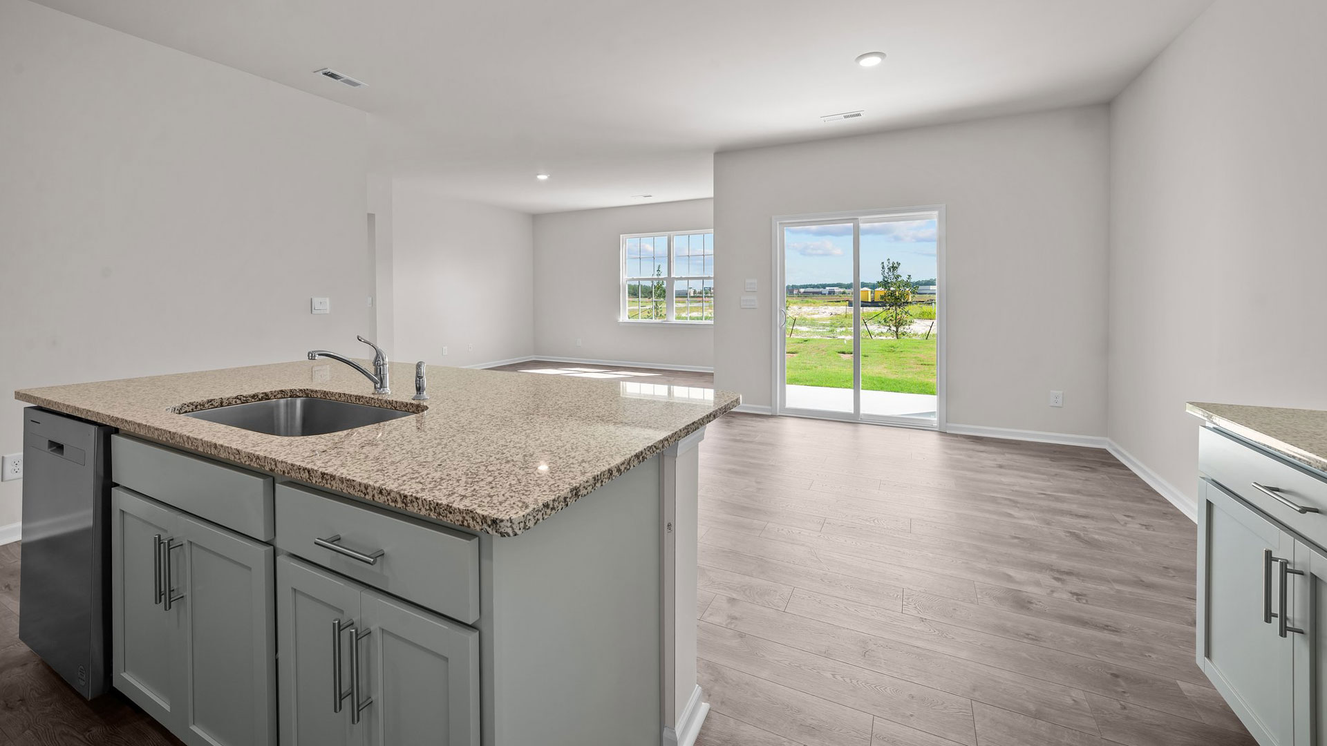 kitchen area with island and stainless steel appliances