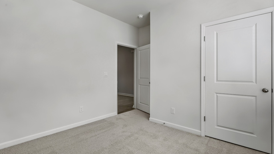 Bedroom with carpet