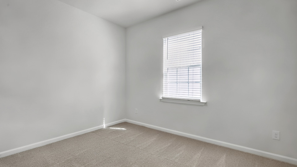 Bedroom with carpet