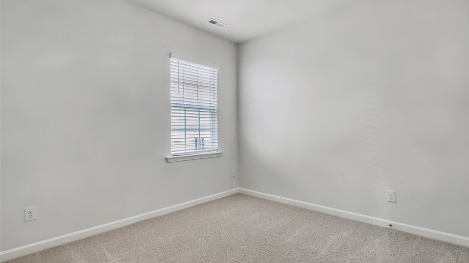 Bedroom with carpet