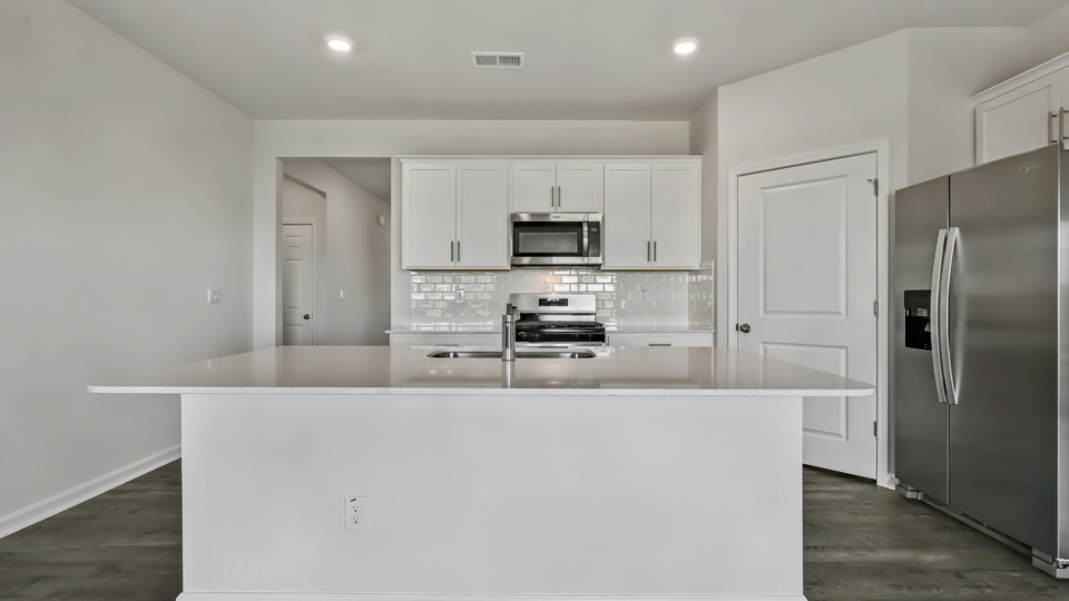 Kitchen with white cabinets