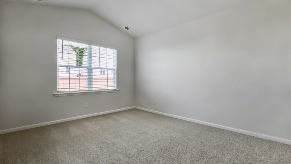 Bedroom with carpet