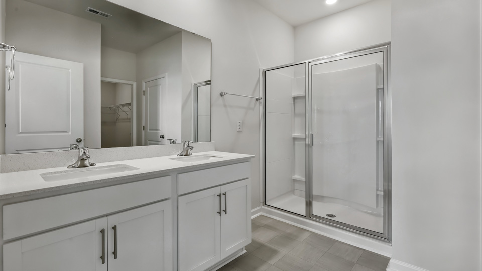 Bathroom with white cabinets
