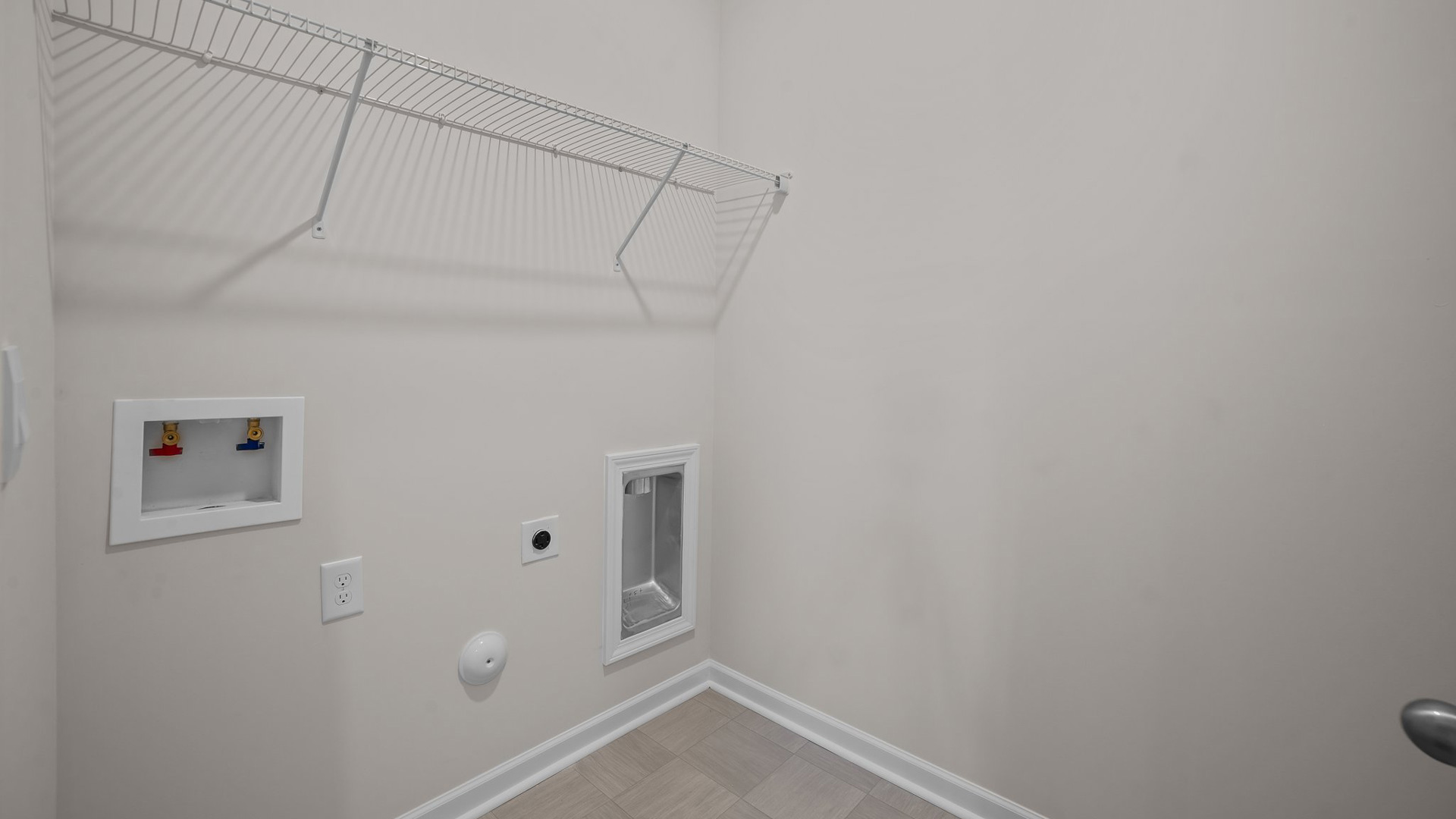 Laundry room with wire shelving