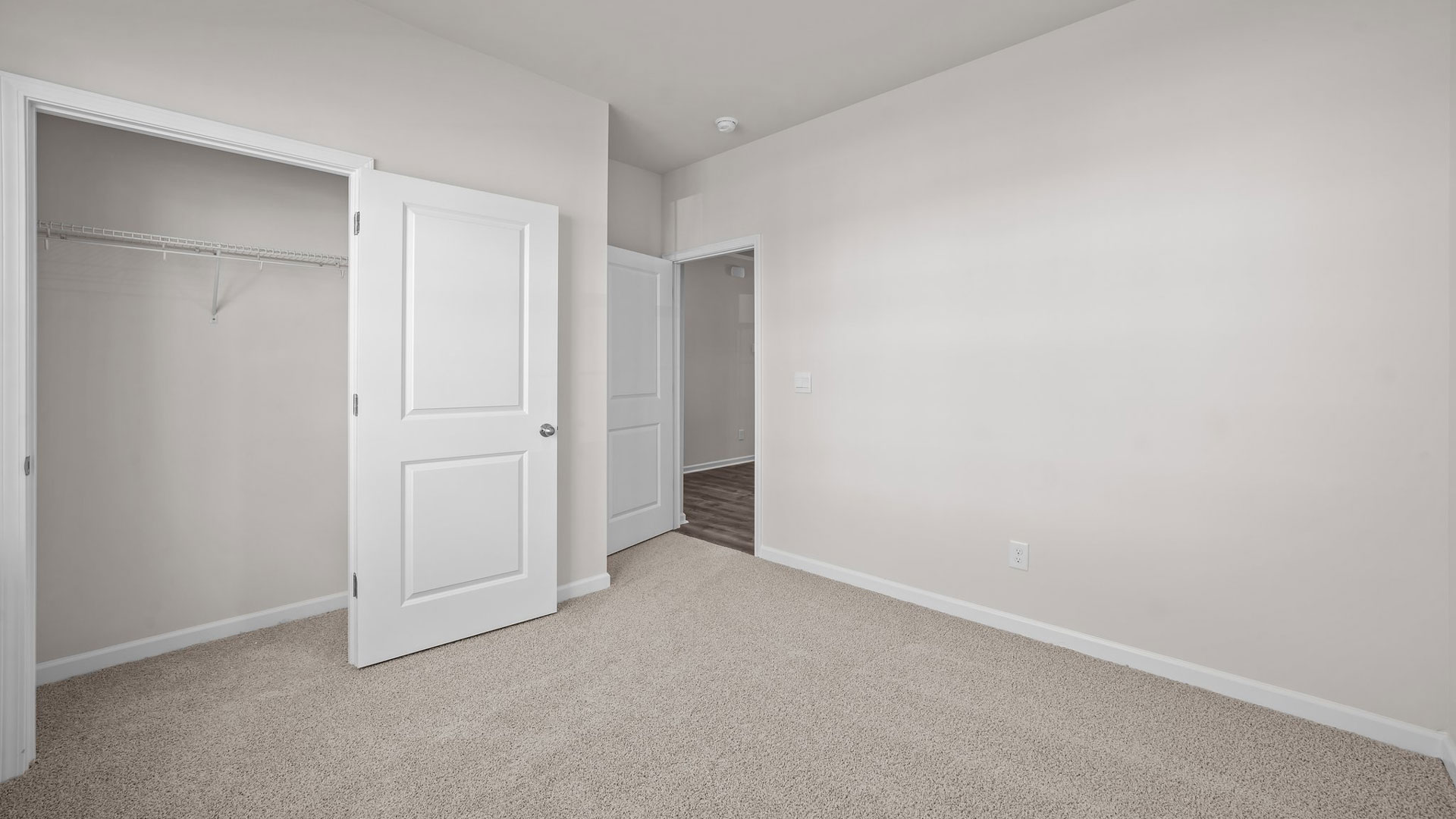 Bedroom with carpet flooring