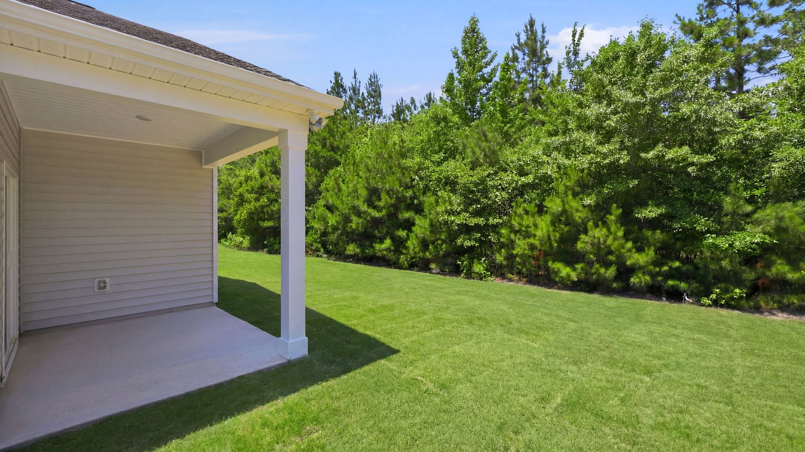 view of covered porch at the rear of the home