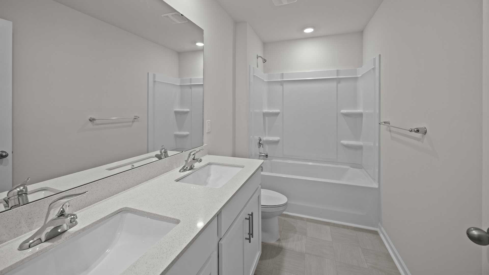 Bathroom with white cabinets