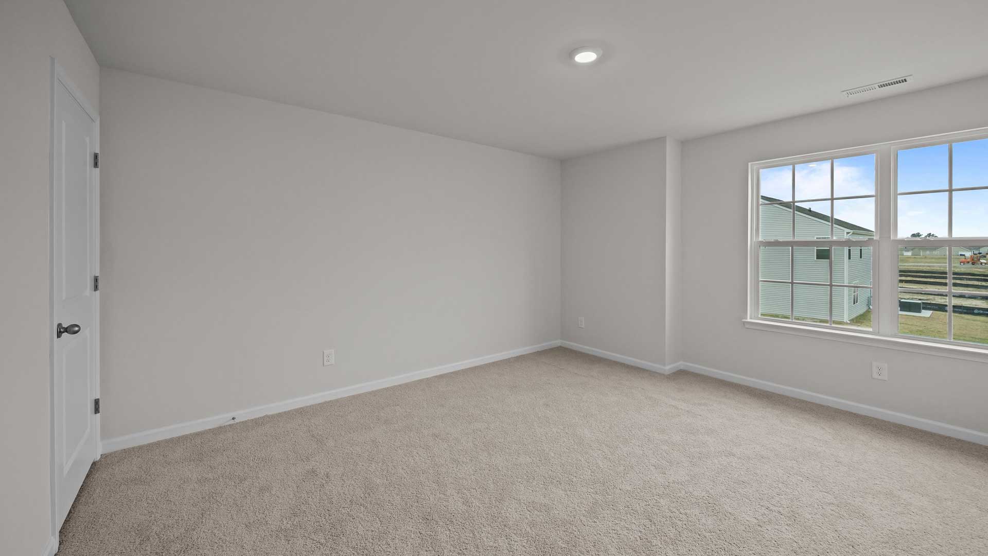 Bedroom with carpet