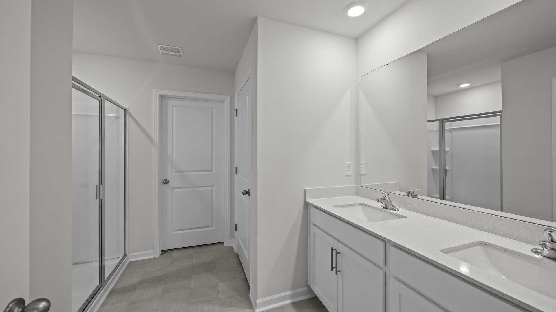 Bathroom with white cabinets