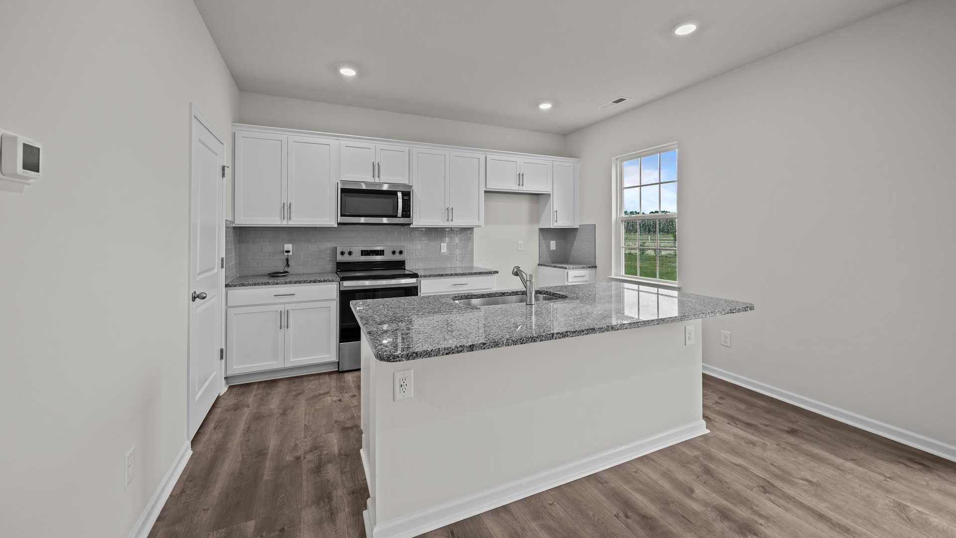 Kitchen with white cabinets