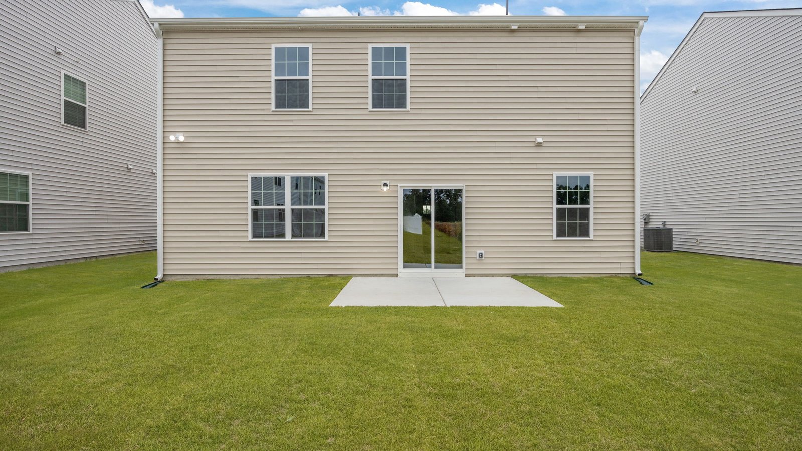 back of home with patio