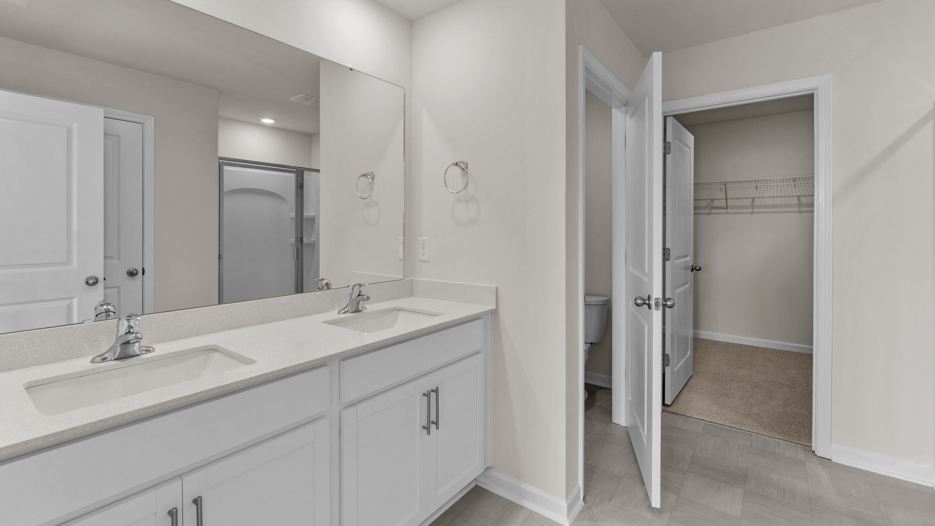 Primary bathroom with quartz counters