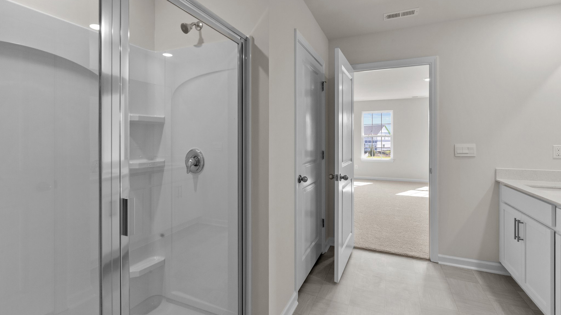 Primary bathroom with walk-in shower