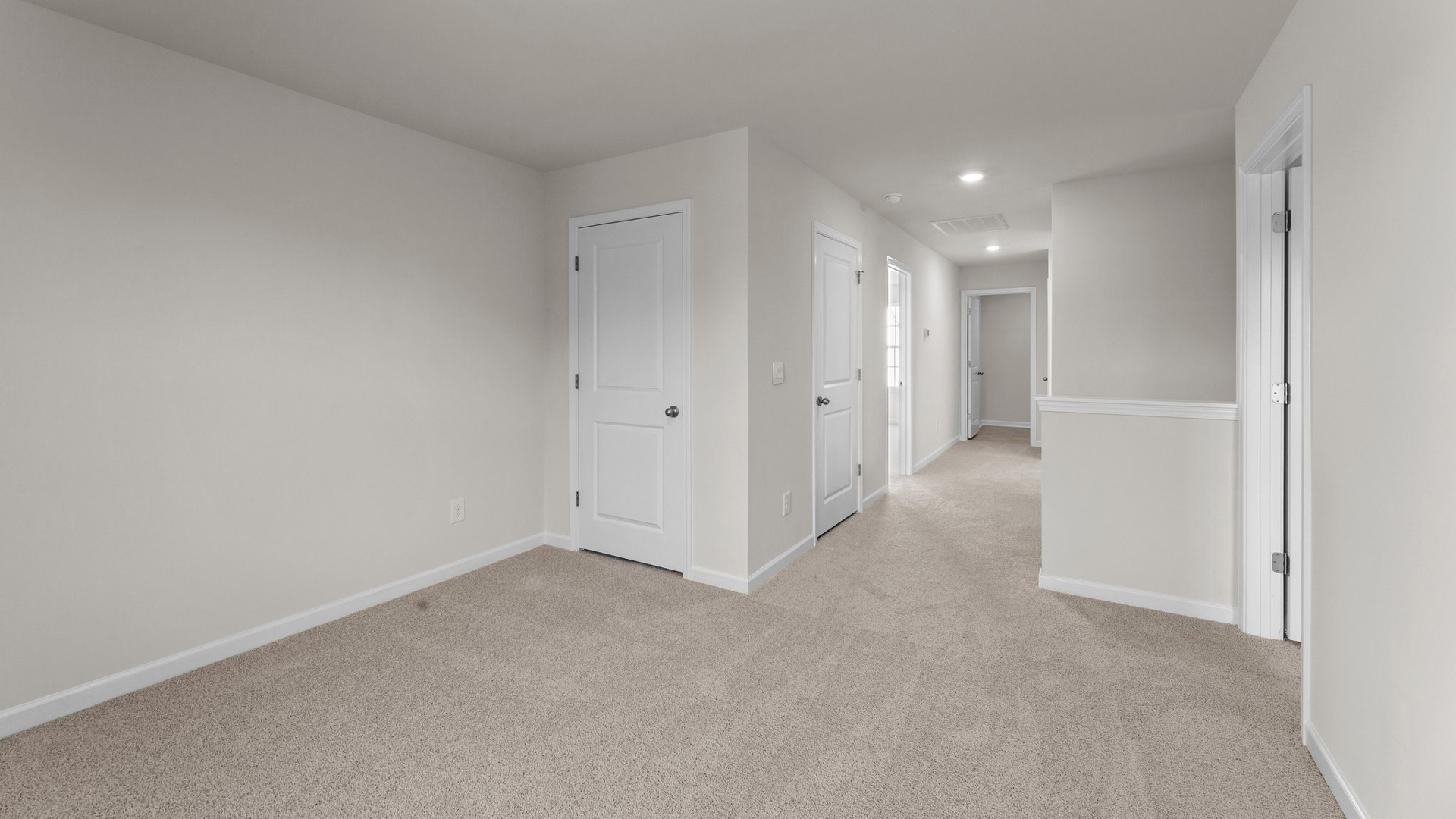 Loft with carpet flooring