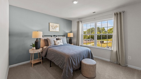 Bedroom with carpet flooring