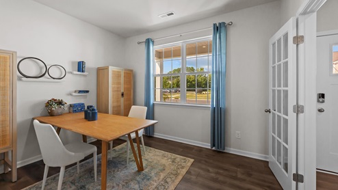 Office with double hung french doors