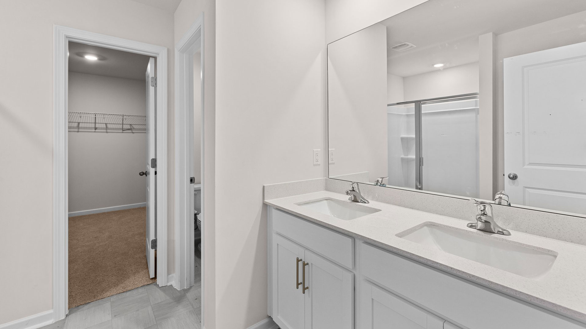 Primary bathroom with quartz counters
