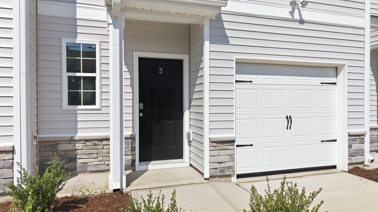 front exterior of two story townhome