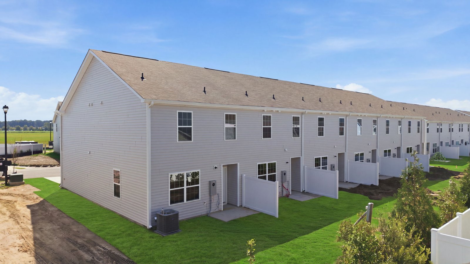 rear view of two story townhome