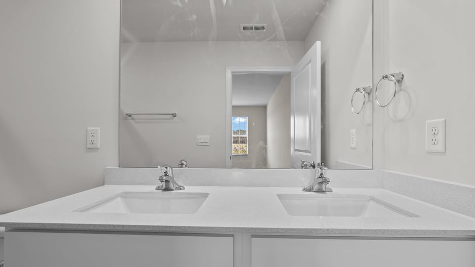 Primary bathroom with quartz counters