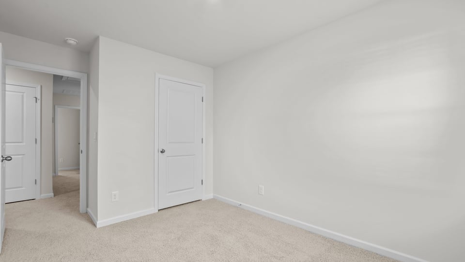 Bedroom with carpet flooring
