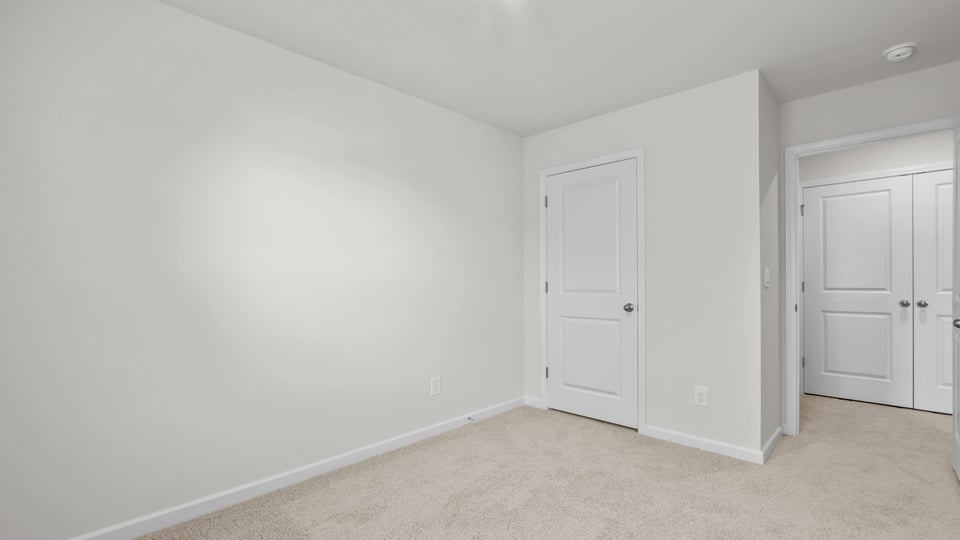 Bedroom with carpet flooring
