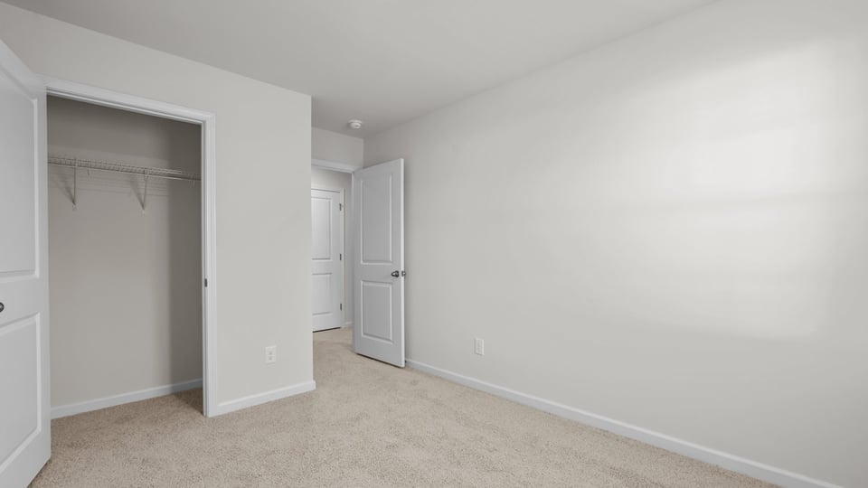 Bedroom with carpet flooring